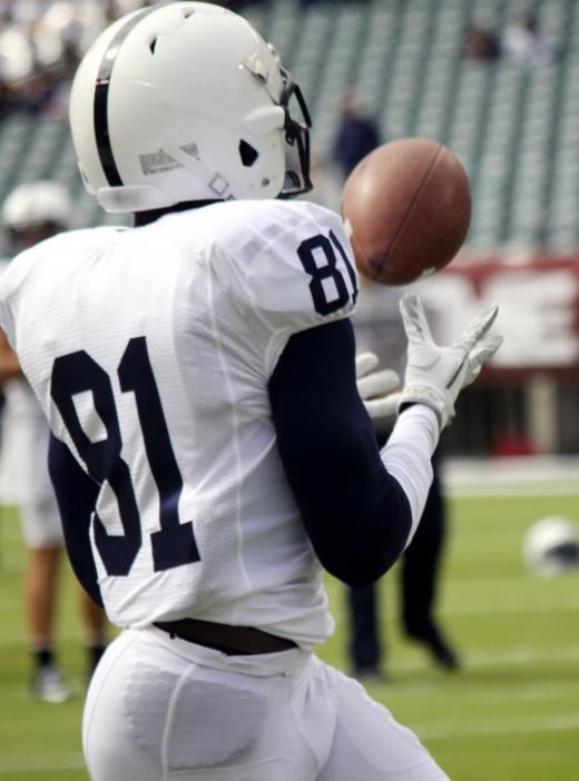 Passing the ball into the end zone is one way to score a two-point conversion.