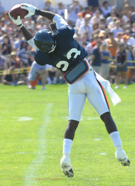 Thundersticks are often waved by fans at a football game to the players of the opposing team.