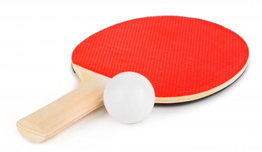 Table tennis racket and ball.