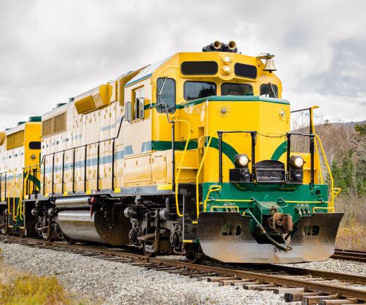 Train spotters focus on identifying or cataloging the sightings and movement of specific trains or pieces of rolling stock, such as locomotive engines.