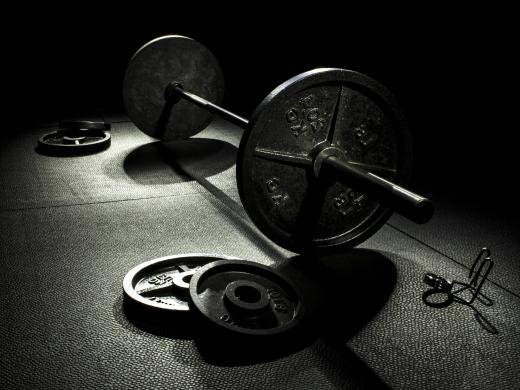 Olympic-style barbells are commonly used for deadlifts.