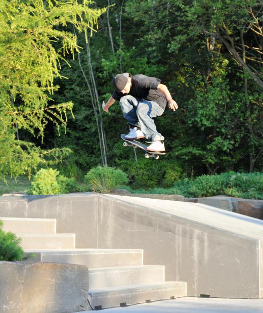 Trucks are the parts of a skateboard that attach underneath the deck.