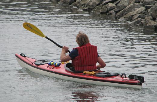 A kayak and paddles are the first items needed for kayak camping.