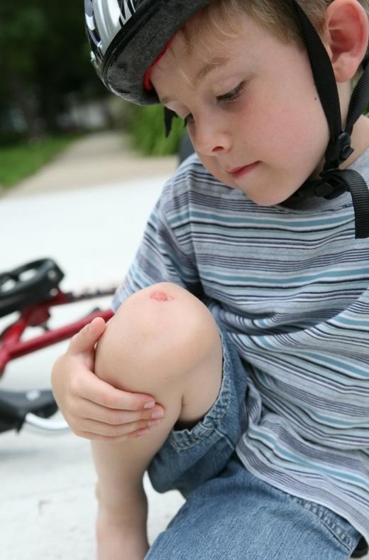 Wearing a helmet may help protect a child from sustaining serious injuries while learning to ride a bike.