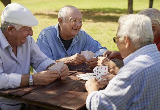 Playing Canasta proceeds clockwise around the table.