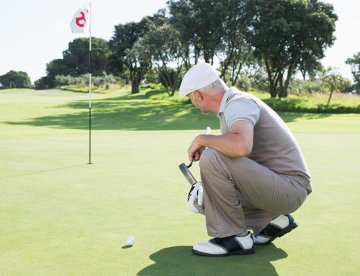 Golf shoes have metal cleats, or studs, on their soles.