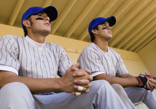 Baseball players wearing caps and pinstripe jerseys.