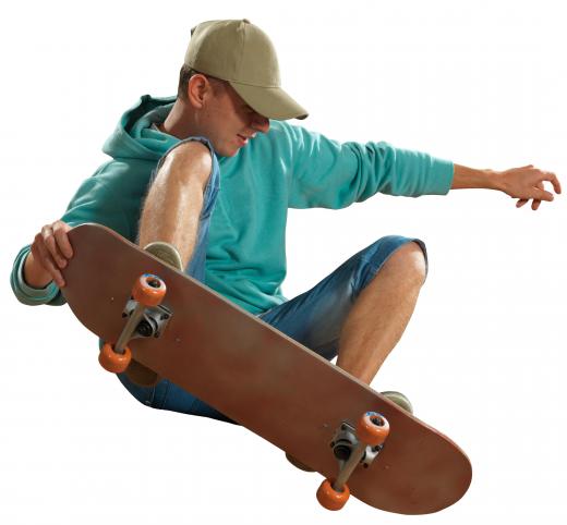 A skateboarder performs a jump.