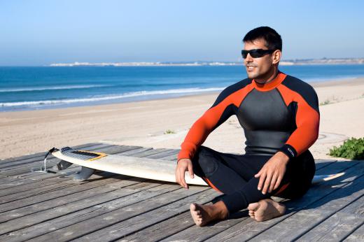 Surfers often wear full body wetsuit.