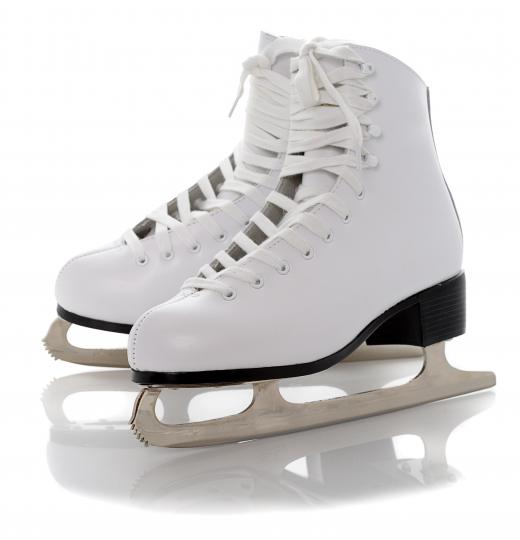 Figure skaters wear ice skates that are lighter than those worn by hockey players.