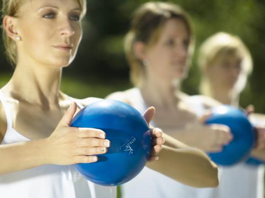 Small medicine balls may be used to tone the arms during some types of yoga and pilates.